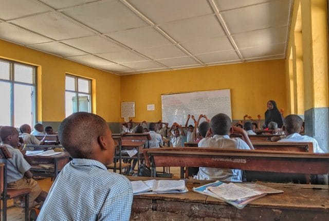 A student in class watching on