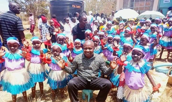 Embu Director of ECDE Jeremiah Ireri-joins ECDE pupils in celebrating their good performance