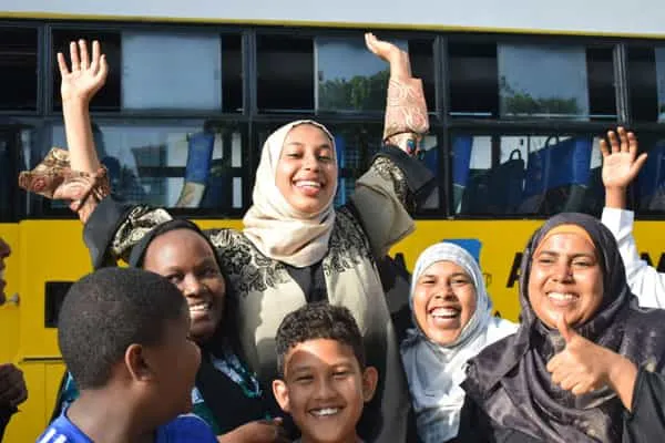 Student Celebrates KCSE exams results after using the KNEC SMS shortcode