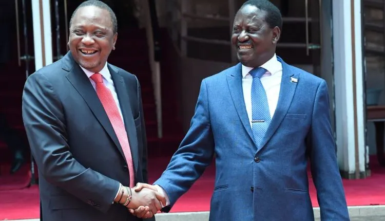 President Uhuru Kenyatta Shaking The Hand Of Former Kenyan Prime Minister Raila Odinga