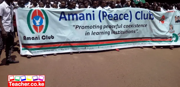 A group of students posing for a photo after launching the Amani Club