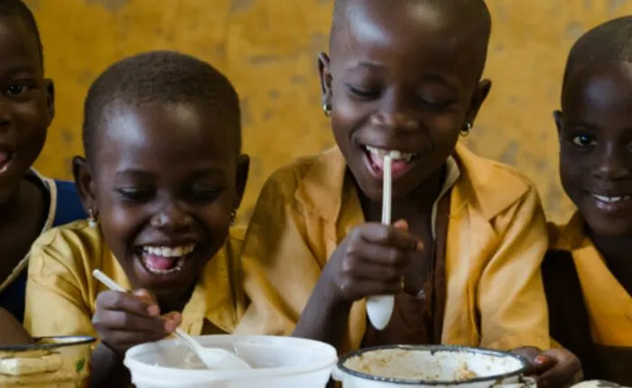 Pupils feeding in school