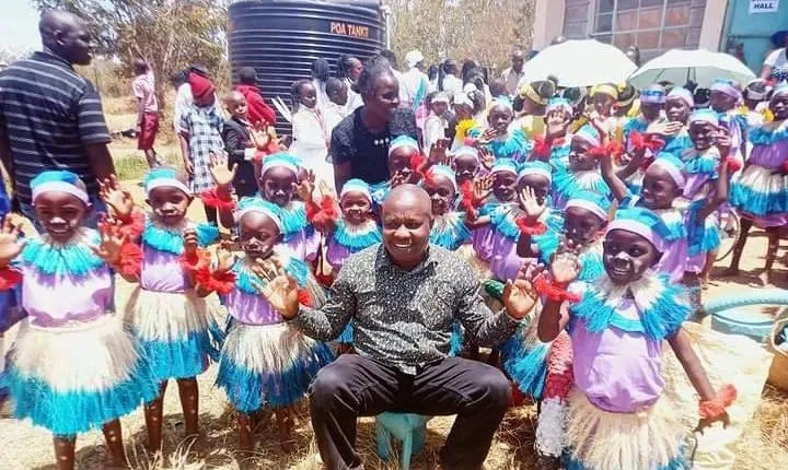 Embu Director of ECDE Jeremiah Ireri-joins ECDE pupils in celebrating their good performance