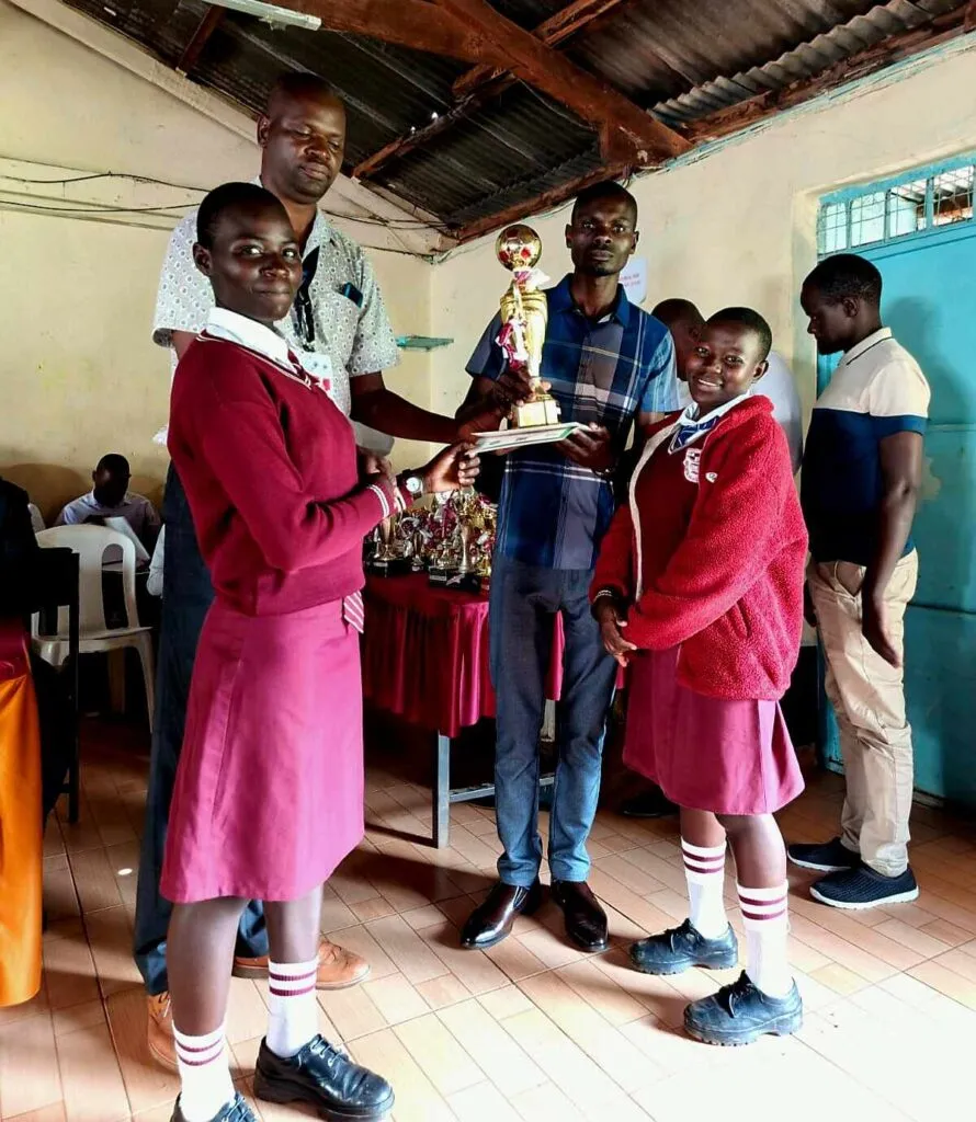 Mercline Stacy and Shillah Perez of Radienya High School, Migori, taking best Chemistry Trophy in 2026 Nyanza KSEF.